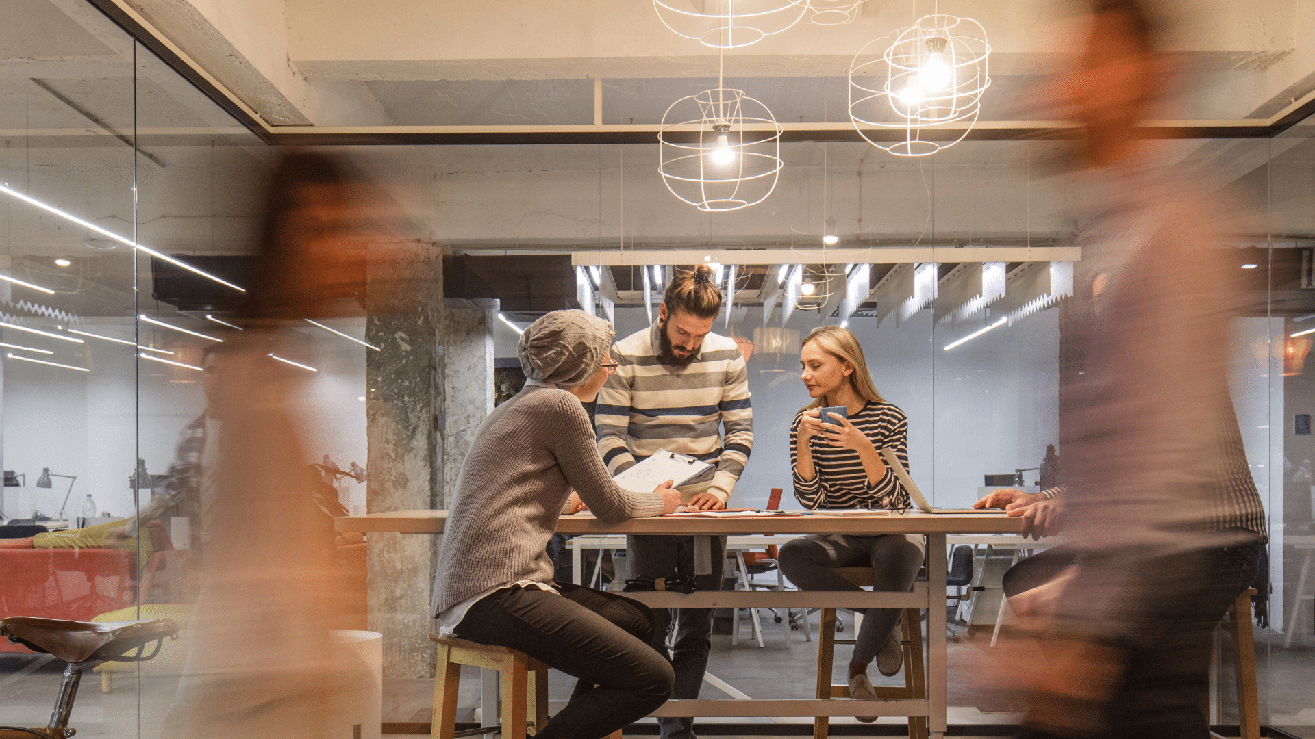 Streamlining JML Processes Best Practices header picture of people walking around a corporate office